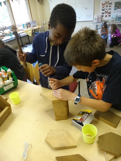 two boys crafting during camp