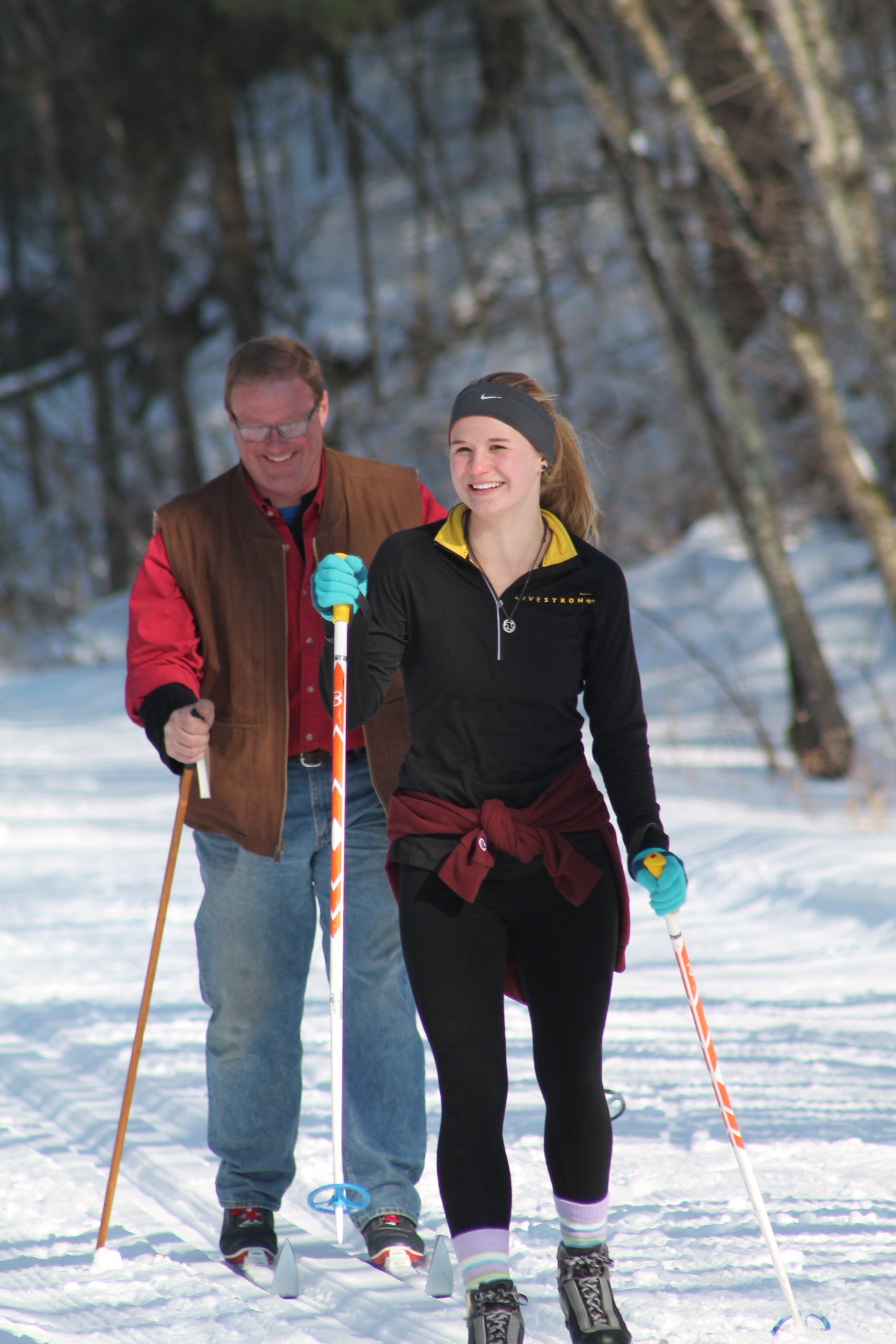 Woman and Man Cross Country Skiing